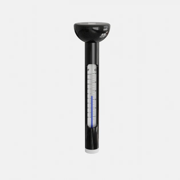En sort plastik thermometer med et gennemsigtigt målerør markeret i centimeter og Fahrenheit. Purely Nordic Termometeret står lodret mod en hvid baggrund.